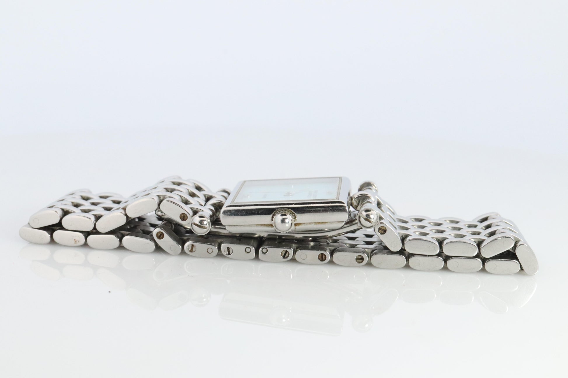 Van Cleef and Arpels 522642 watch. Classique Square Blue Shell Dial