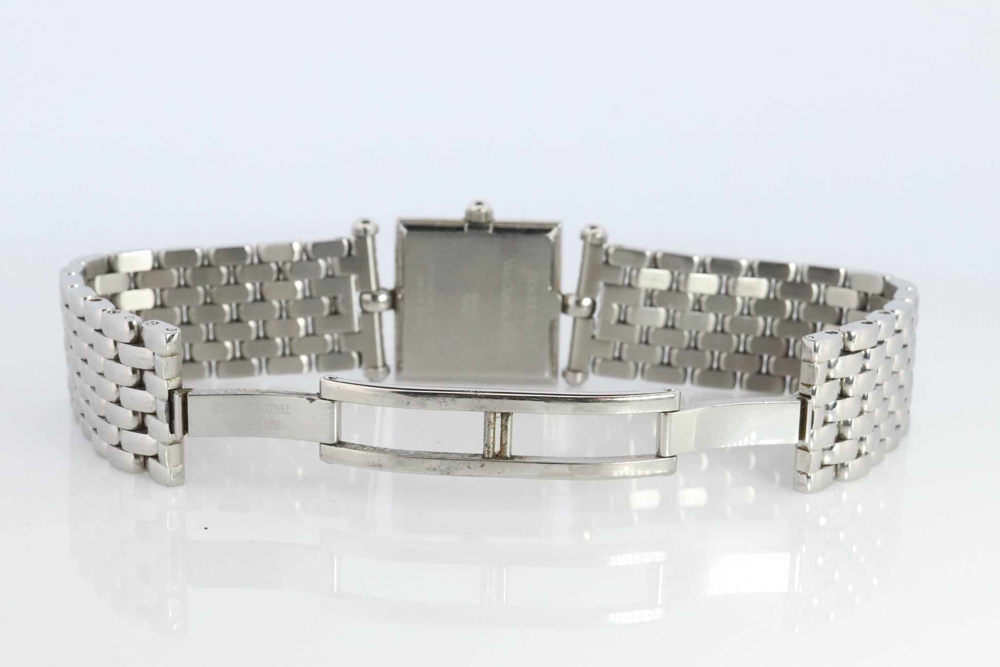 Van Cleef and Arpels 522642 watch. Classique Square Blue Shell Dial