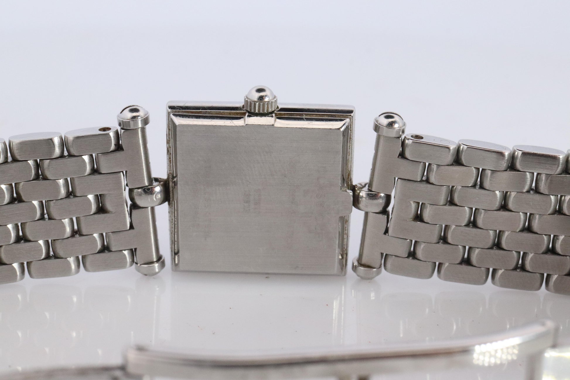 Van Cleef and Arpels 522642 watch. Classique Square Blue Shell Dial