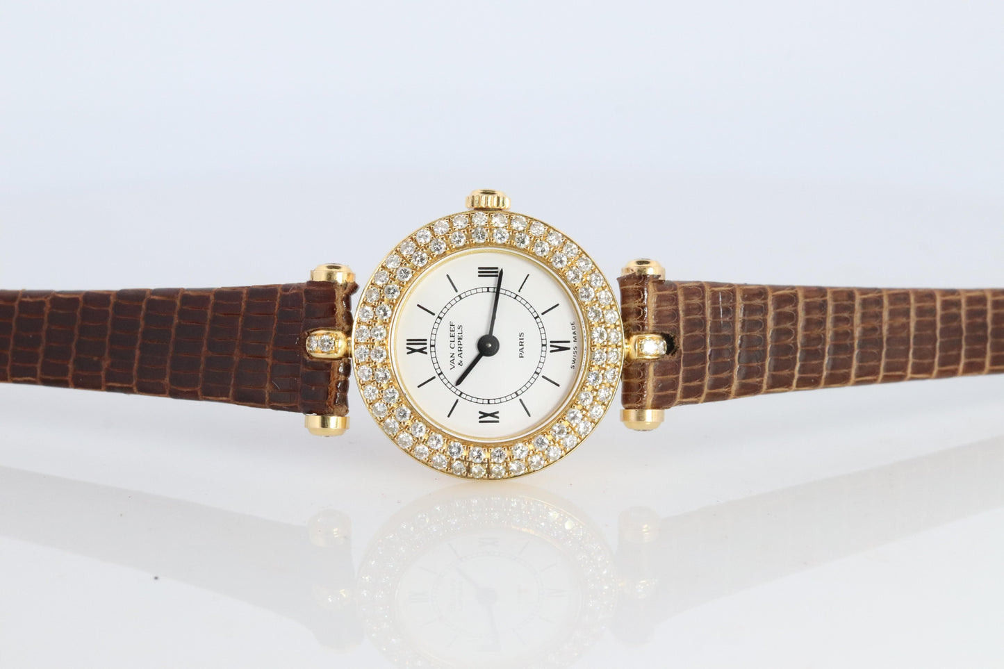 Van Cleef and Arpels 18932 B2 watch. 18k Gold VCA Classique Diamond Bezel.