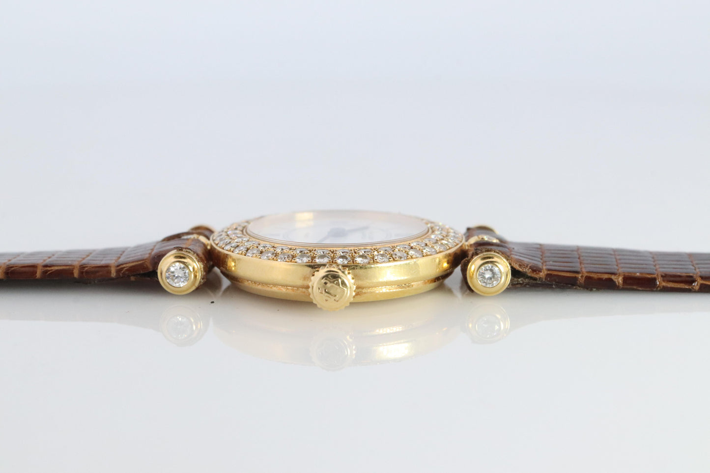 Van Cleef and Arpels 18932 B2 watch. 18k Gold VCA Classique Diamond Bezel.