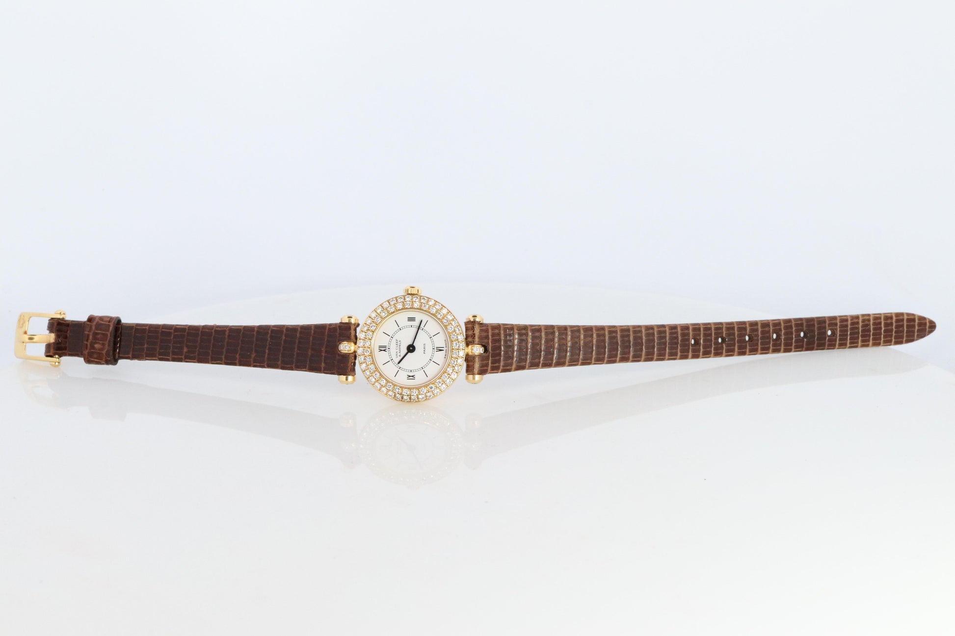 Van Cleef and Arpels 18932 B2 watch. 18k Gold VCA Classique Diamond Bezel.
