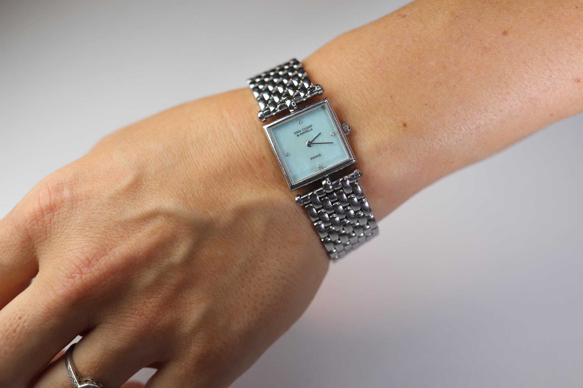 Van Cleef and Arpels 522642 watch. Classique Square Blue Shell Dial
