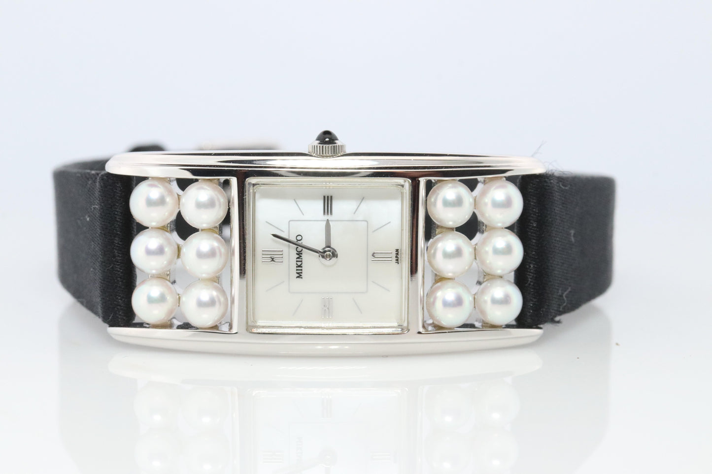 Mikimoto Sterling Silver Watch. Mikimoto Pearl and MOP Dial ladies watch
