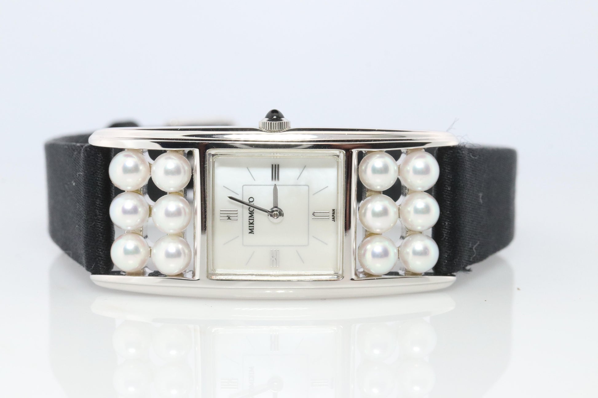 Mikimoto Sterling Silver Watch. Mikimoto Pearl and MOP Dial ladies watch