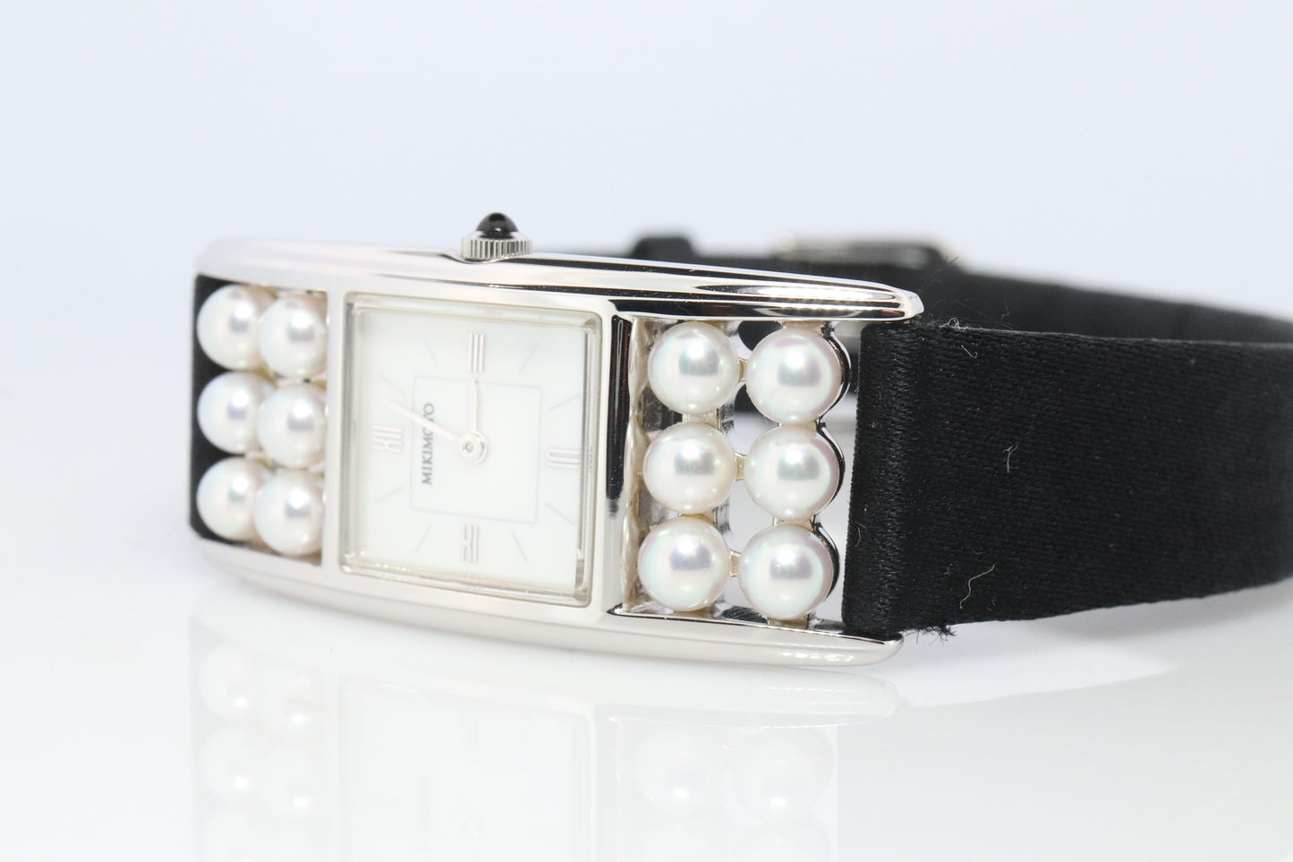 Mikimoto Sterling Silver Watch. Mikimoto Pearl and MOP Dial ladies watch