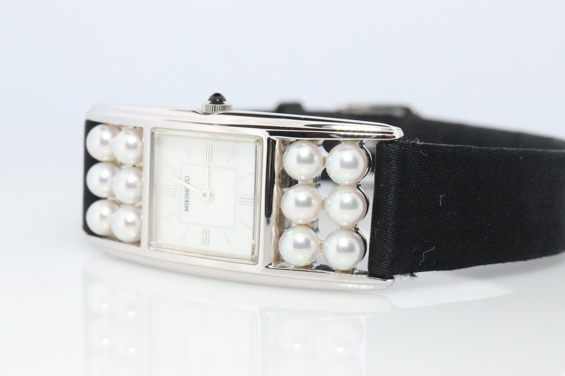 Mikimoto Sterling Silver Watch. Mikimoto Pearl and MOP Dial ladies watch
