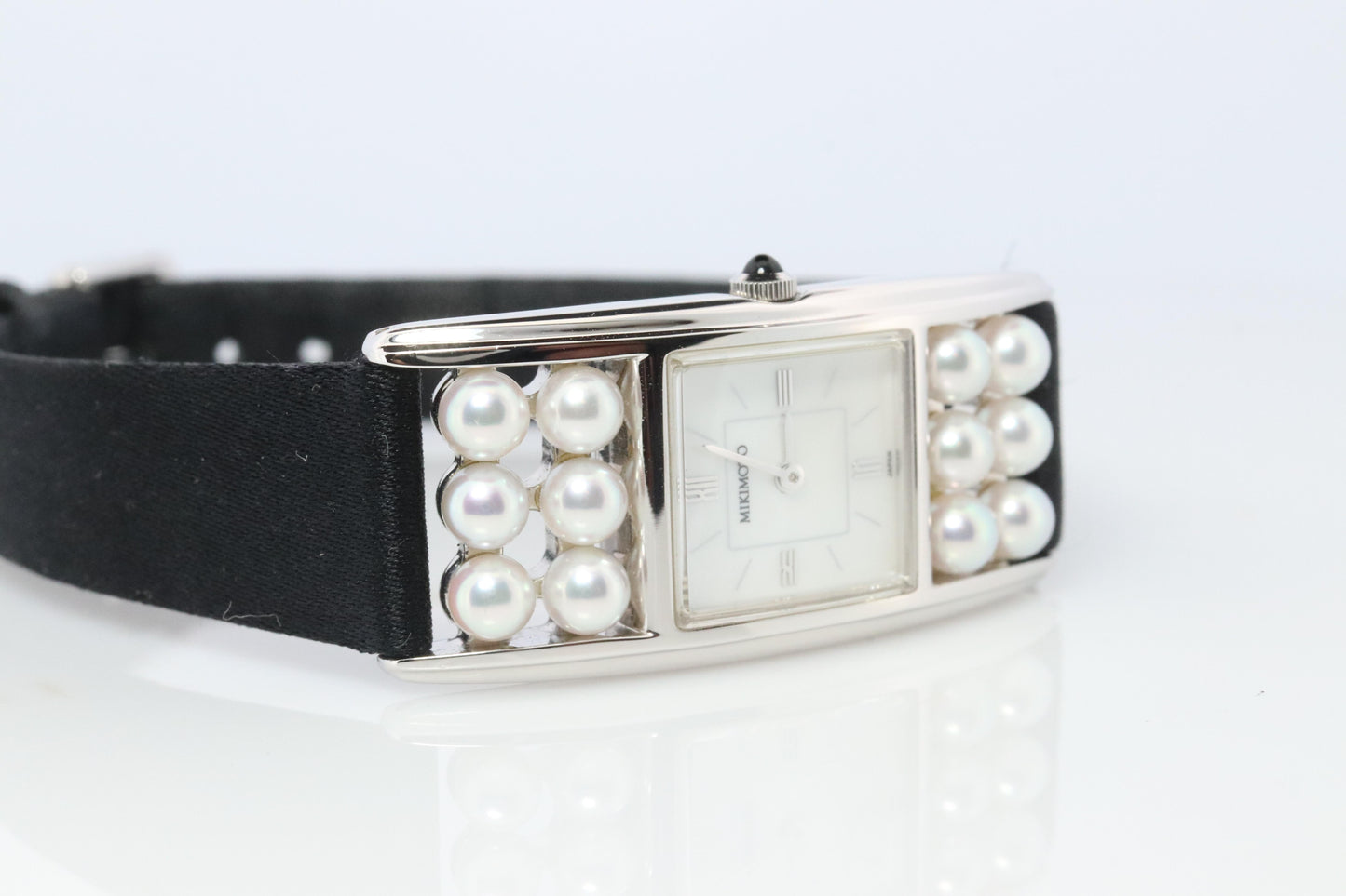 Mikimoto Sterling Silver Watch. Mikimoto Pearl and MOP Dial ladies watch