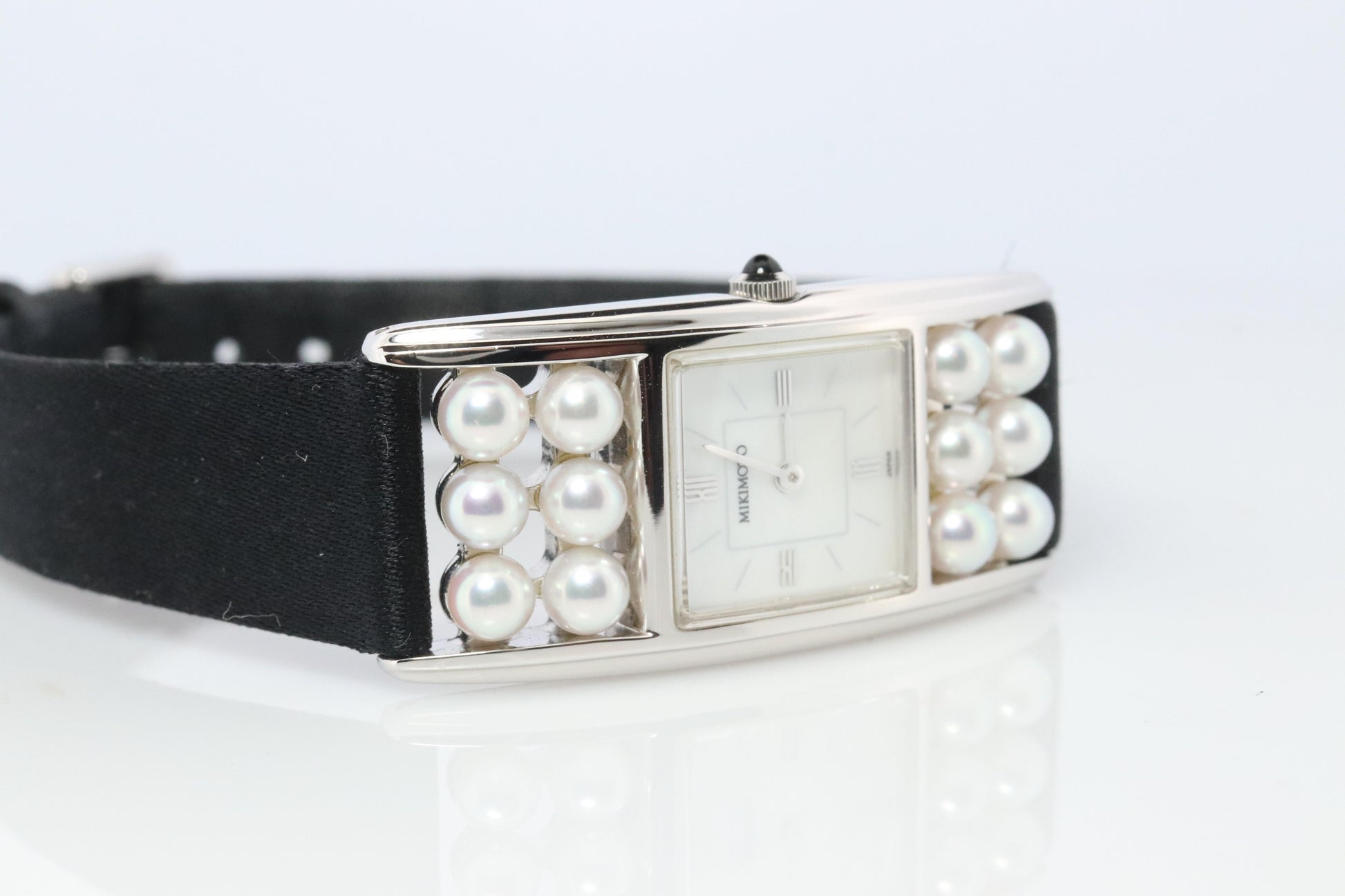 Mikimoto Sterling Silver Watch. Mikimoto Pearl and MOP Dial ladies watch