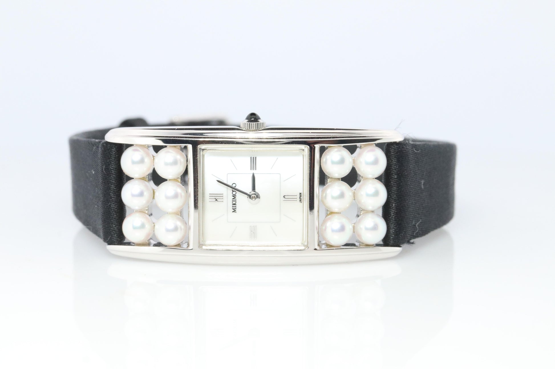 Mikimoto Sterling Silver Watch. Mikimoto Pearl and MOP Dial ladies watch