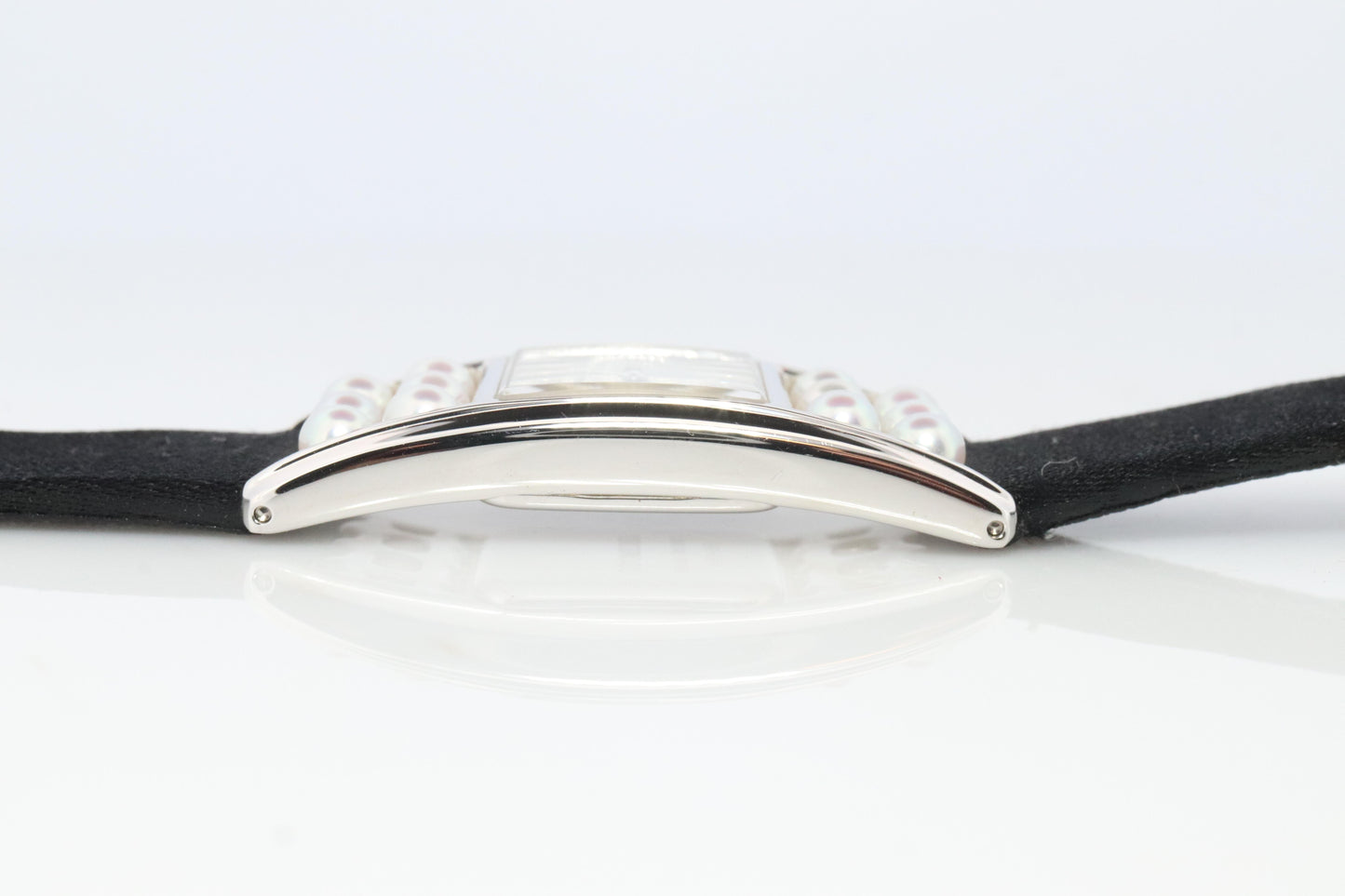 Mikimoto Sterling Silver Watch. Mikimoto Pearl and MOP Dial ladies watch