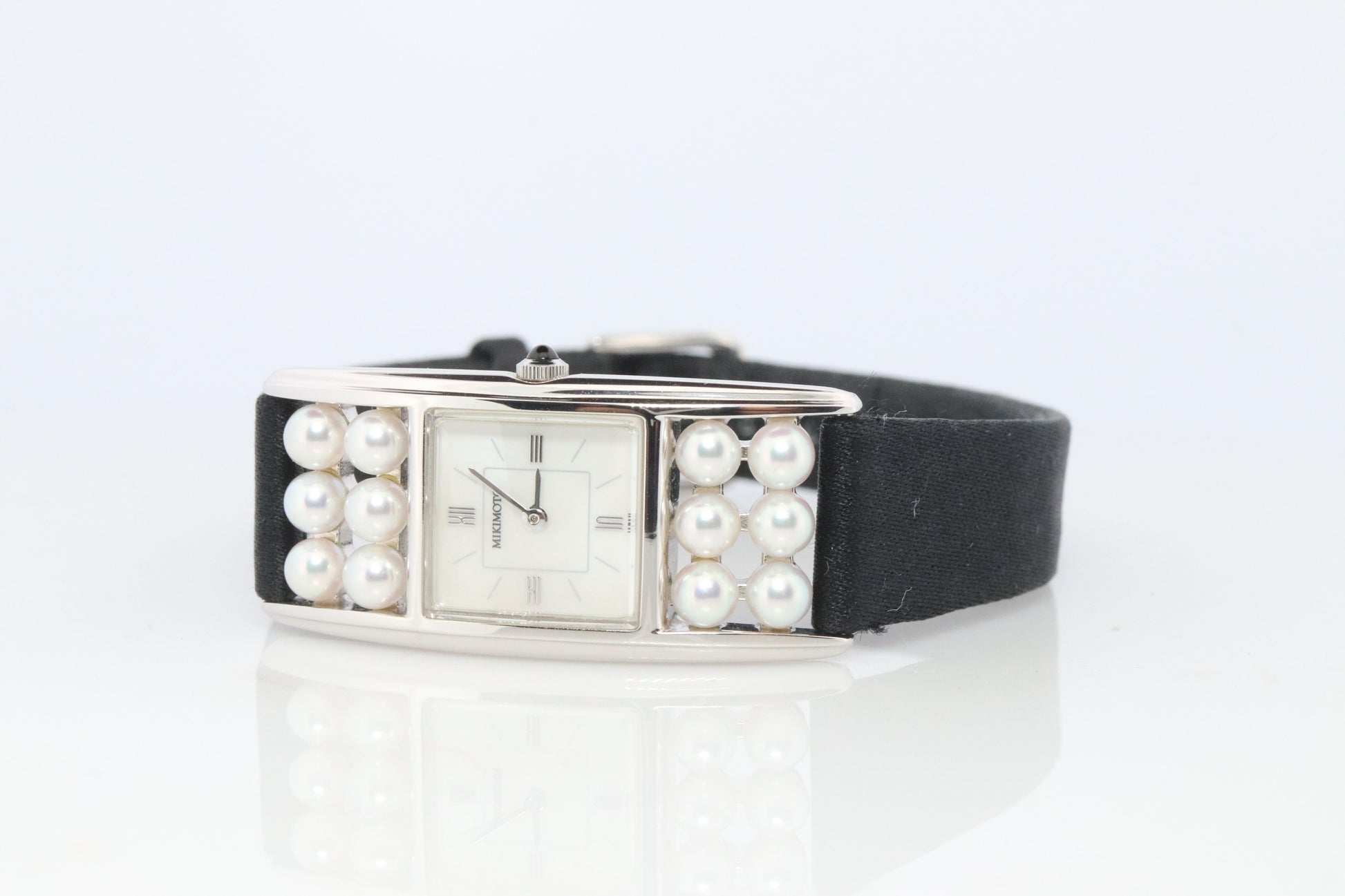 Mikimoto Sterling Silver Watch. Mikimoto Pearl and MOP Dial ladies watch