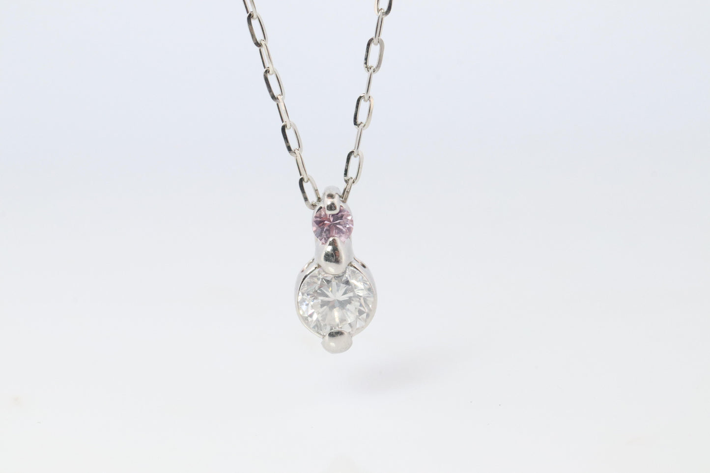 Large PT900 Diamond and Pink accent Pendant. Platinum Pt900 rolo necklace.