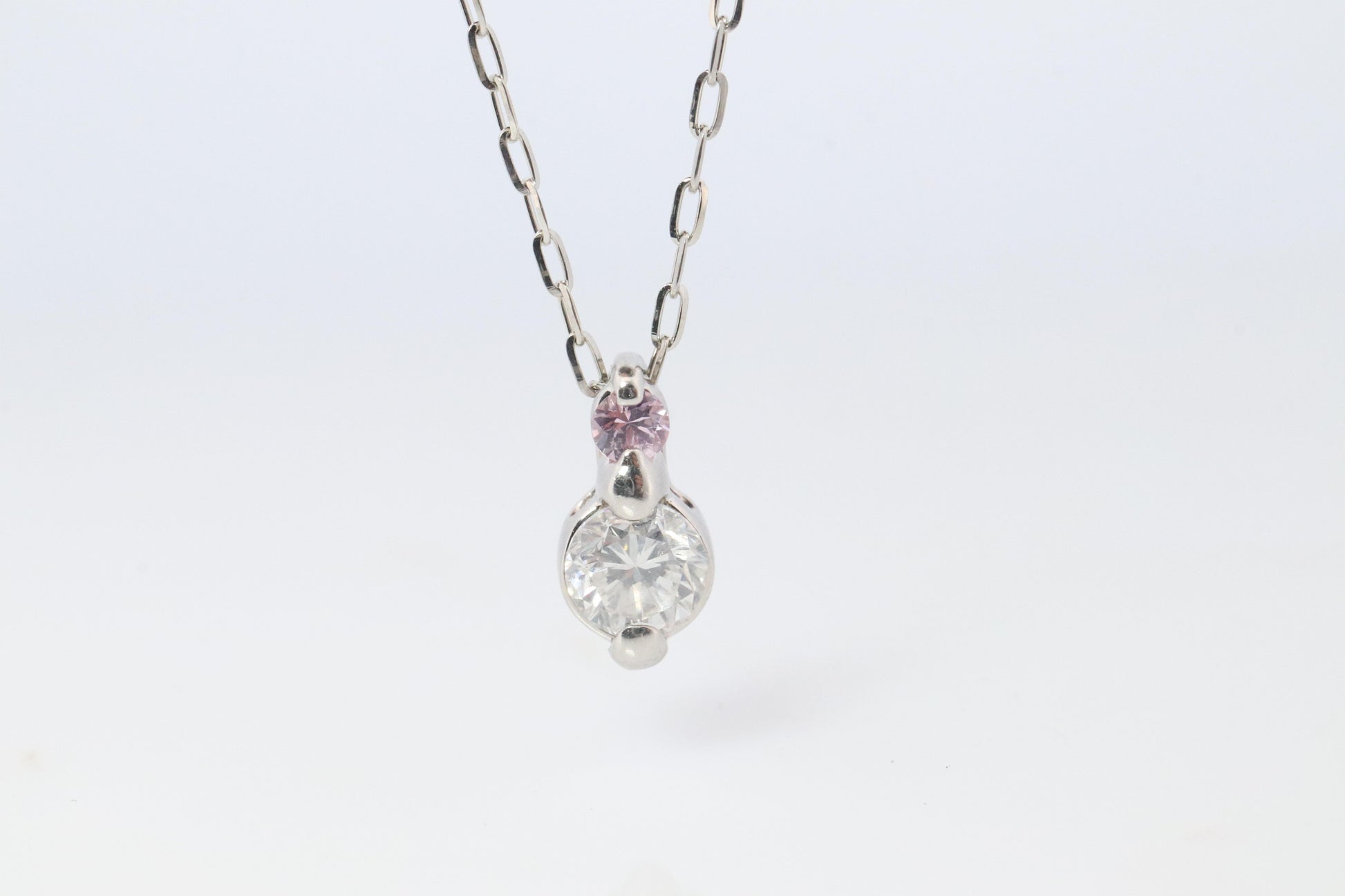 Large PT900 Diamond and Pink accent Pendant. Platinum Pt900 rolo necklace.