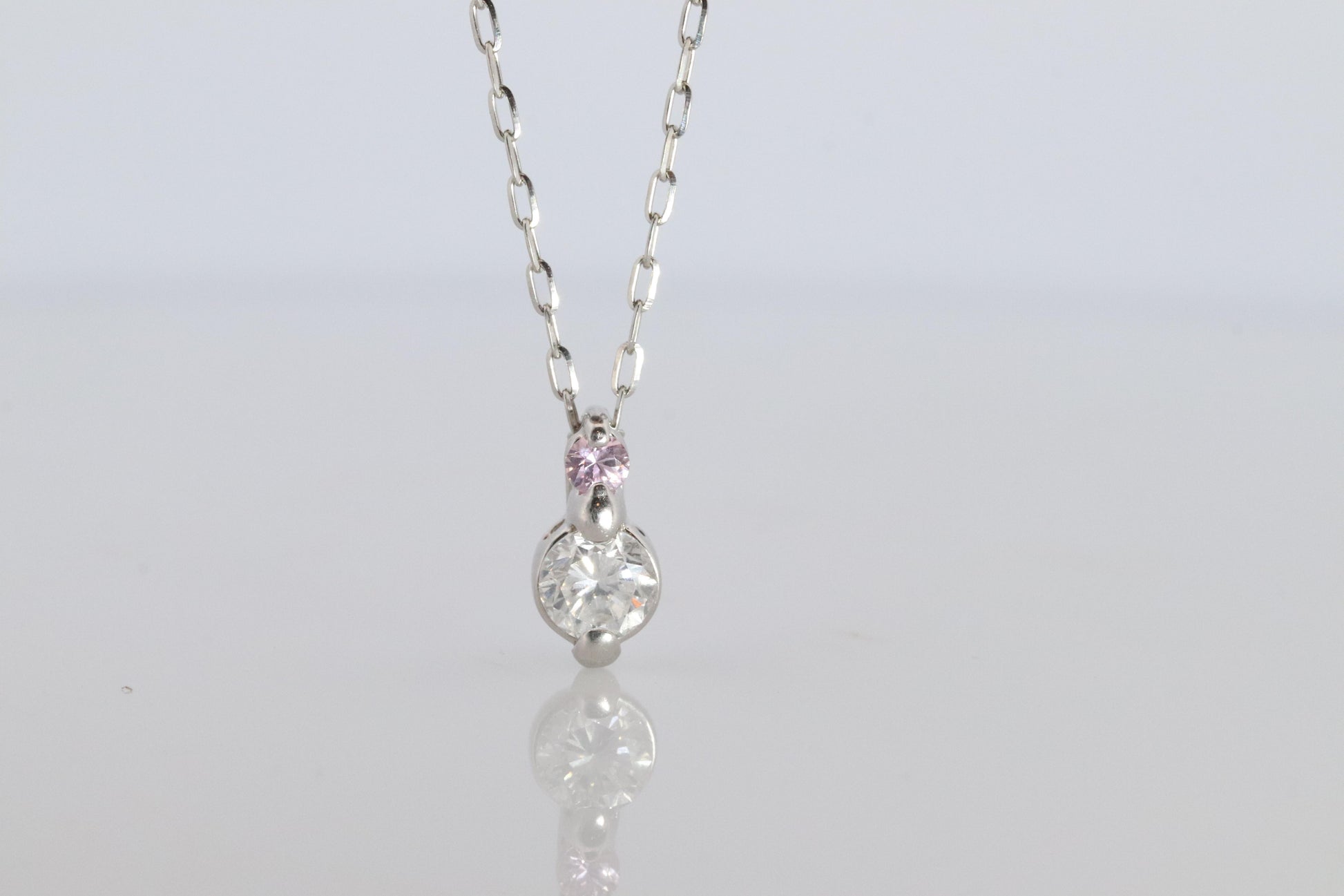 Large PT900 Diamond and Pink accent Pendant. Platinum Pt900 rolo necklace.