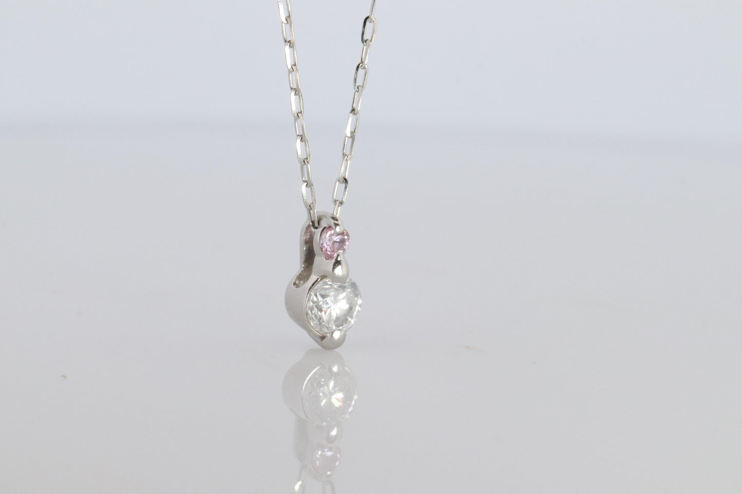 Large PT900 Diamond and Pink accent Pendant. Platinum Pt900 rolo necklace.