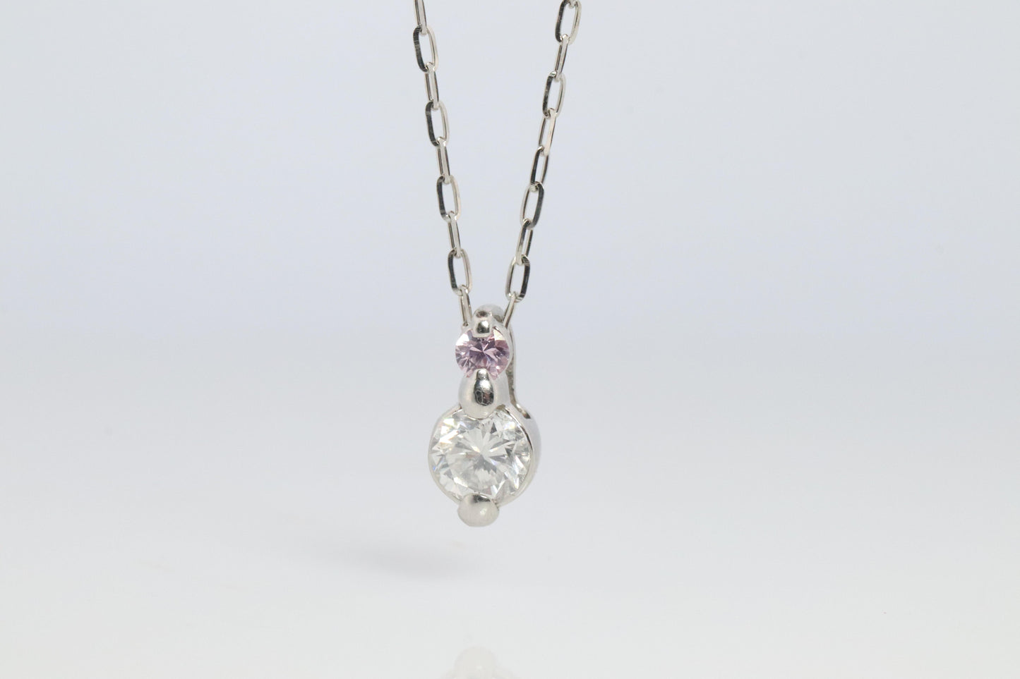 Large PT900 Diamond and Pink accent Pendant. Platinum Pt900 rolo necklace.