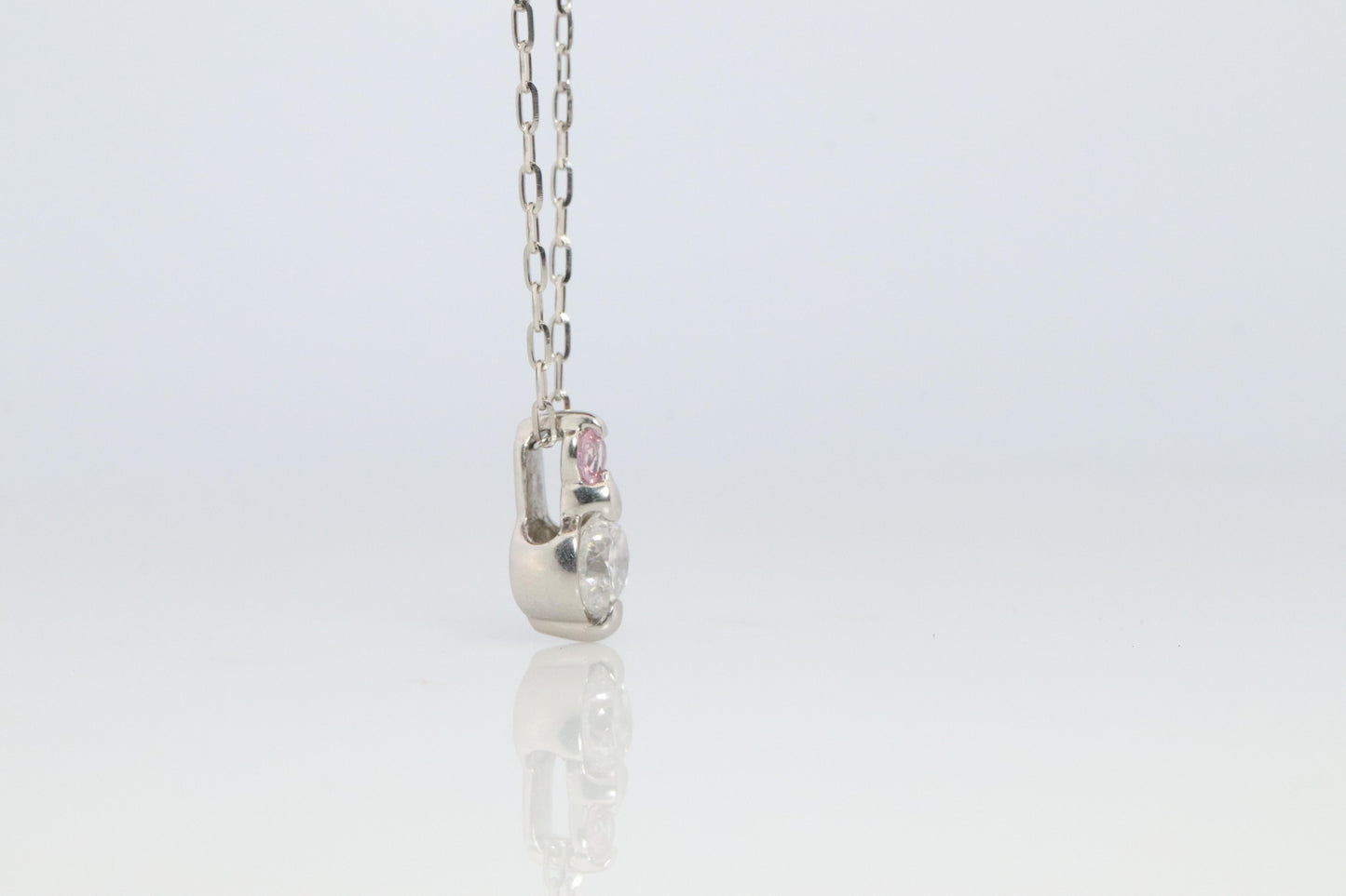 Large PT900 Diamond and Pink accent Pendant. Platinum Pt900 rolo necklace.