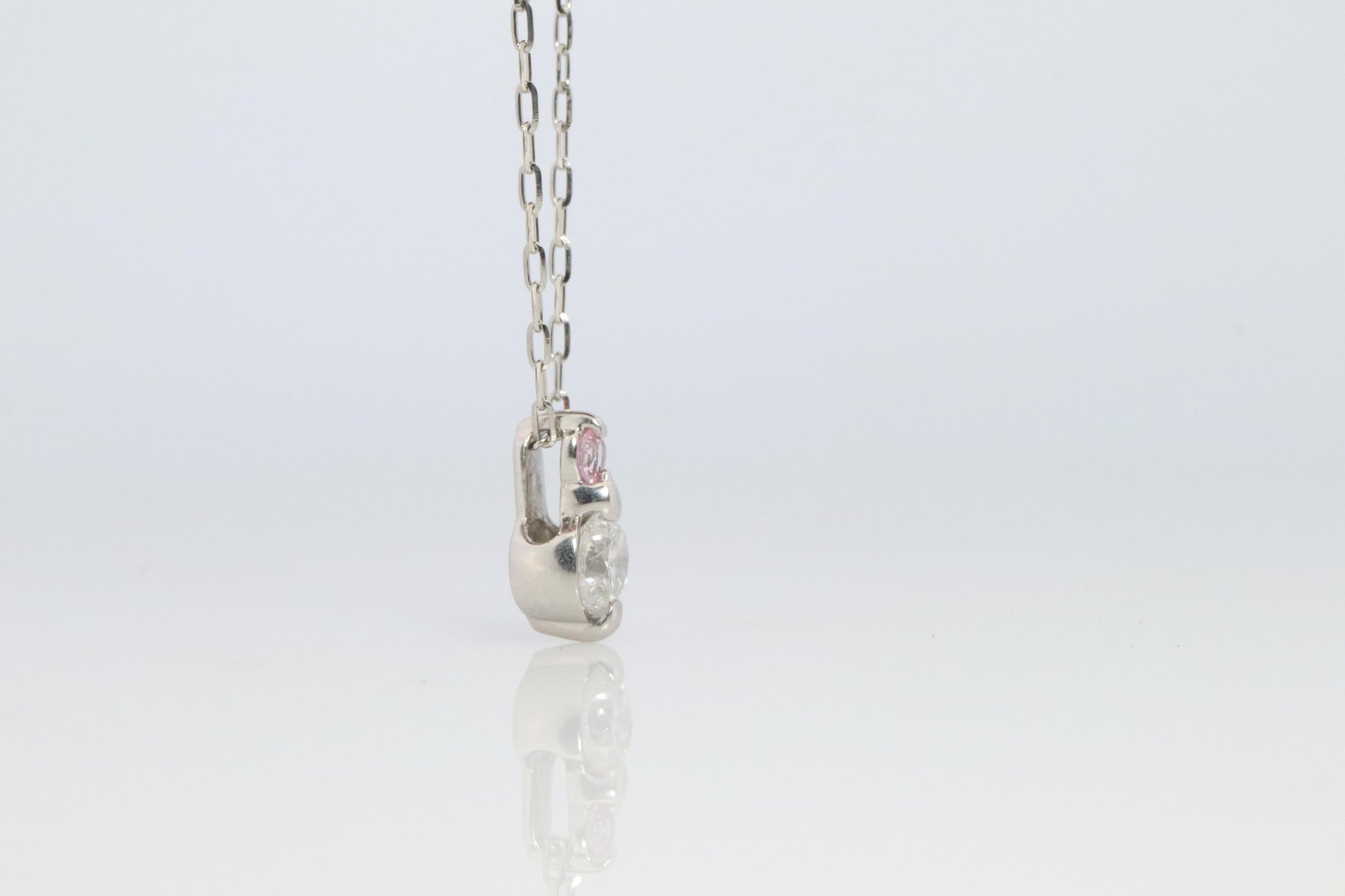 Large PT900 Diamond and Pink accent Pendant. Platinum Pt900 rolo necklace.