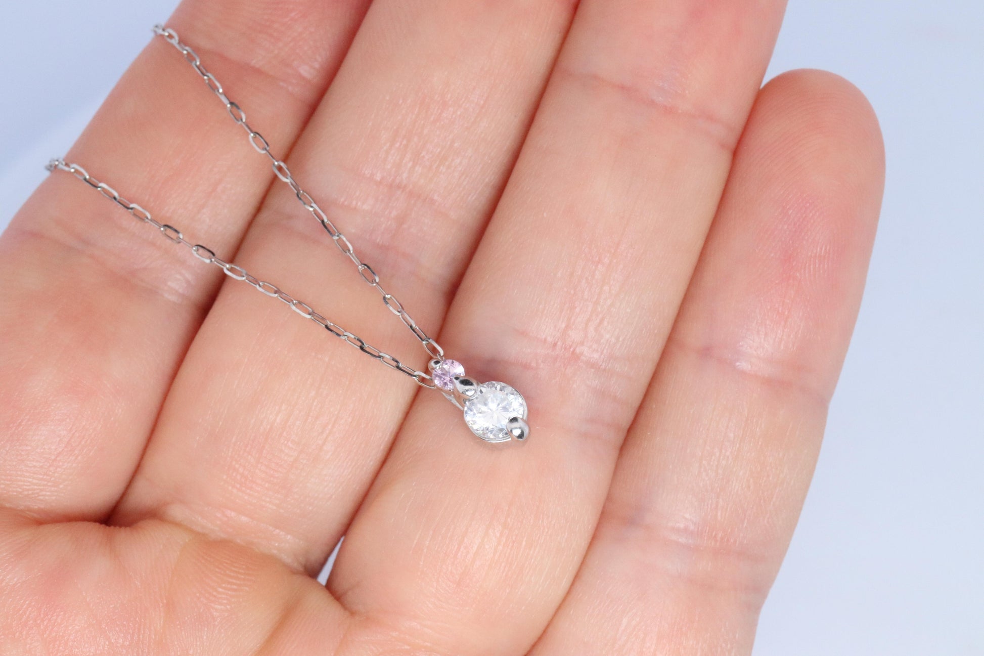 Large PT900 Diamond and Pink accent Pendant. Platinum Pt900 rolo necklace.