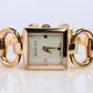 Vintage GUCCI Tornavoni 120 Quartz Wrist Watch. Gucci YA120520 Gold tone Bangle