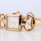 Vintage GUCCI Tornavoni 120 Quartz Wrist Watch. Gucci YA120520 Gold tone Bangle