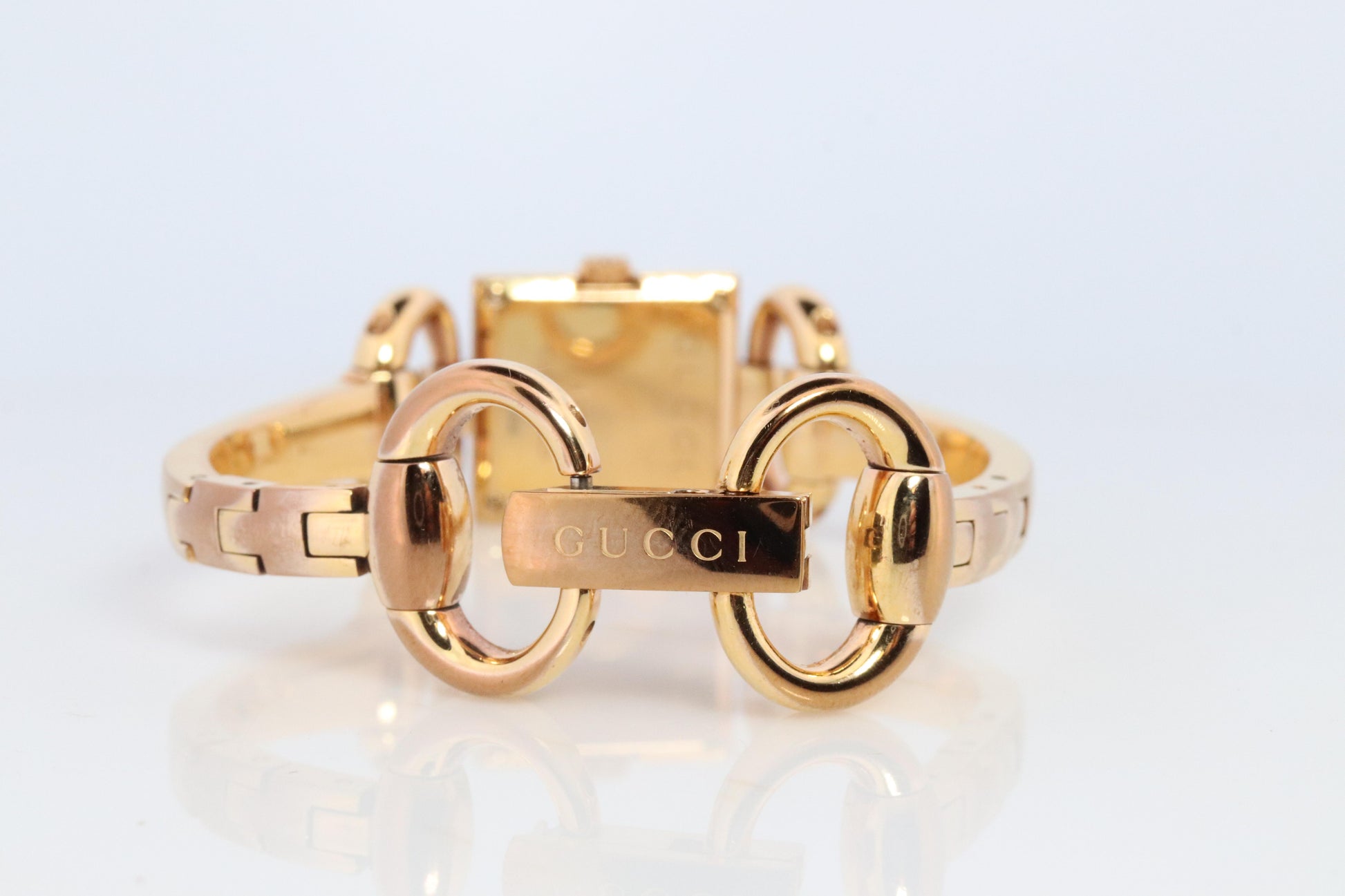 Vintage GUCCI Tornavoni 120 Quartz Wrist Watch. Gucci YA120520 Gold tone Bangle