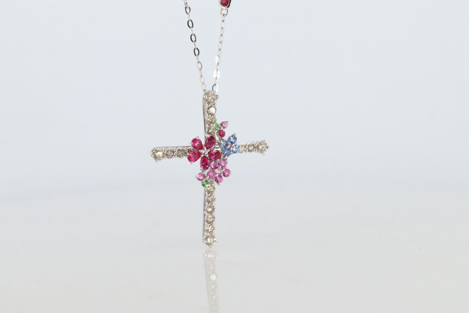18k Diamond Sapphire Flower Crucifix Pendant. 18k WG Multicolor Cross Necklace.