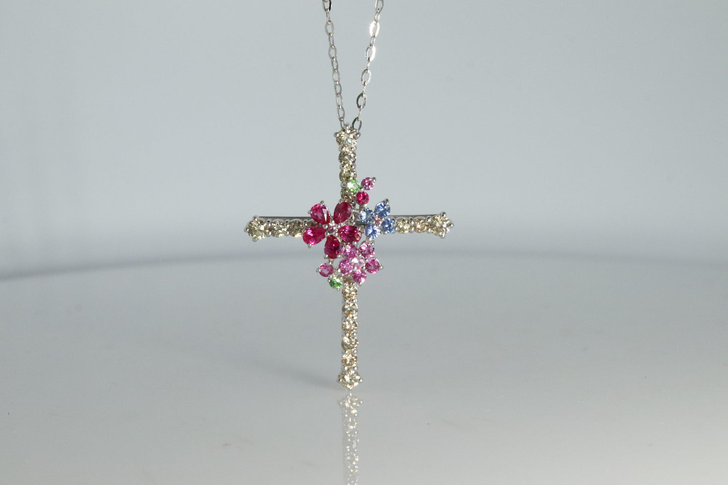 18k Diamond Sapphire Flower Crucifix Pendant. 18k WG Multicolor Cross Necklace.