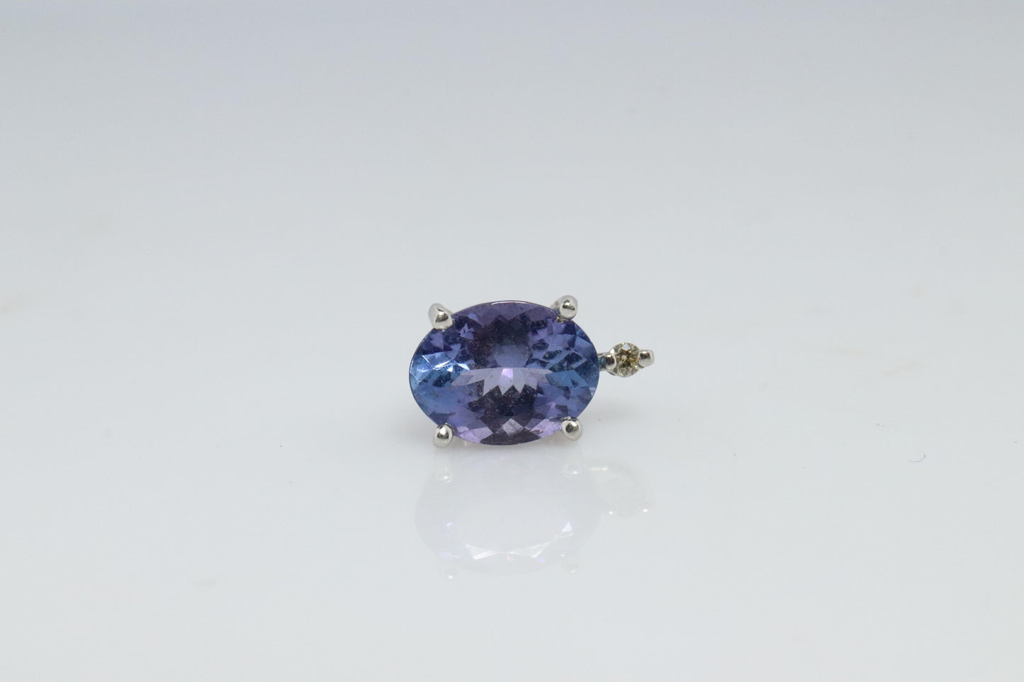 Tanzanite and diamond Pendant. PT850 Platinum Dainty Oval Tanzanite Solitaire