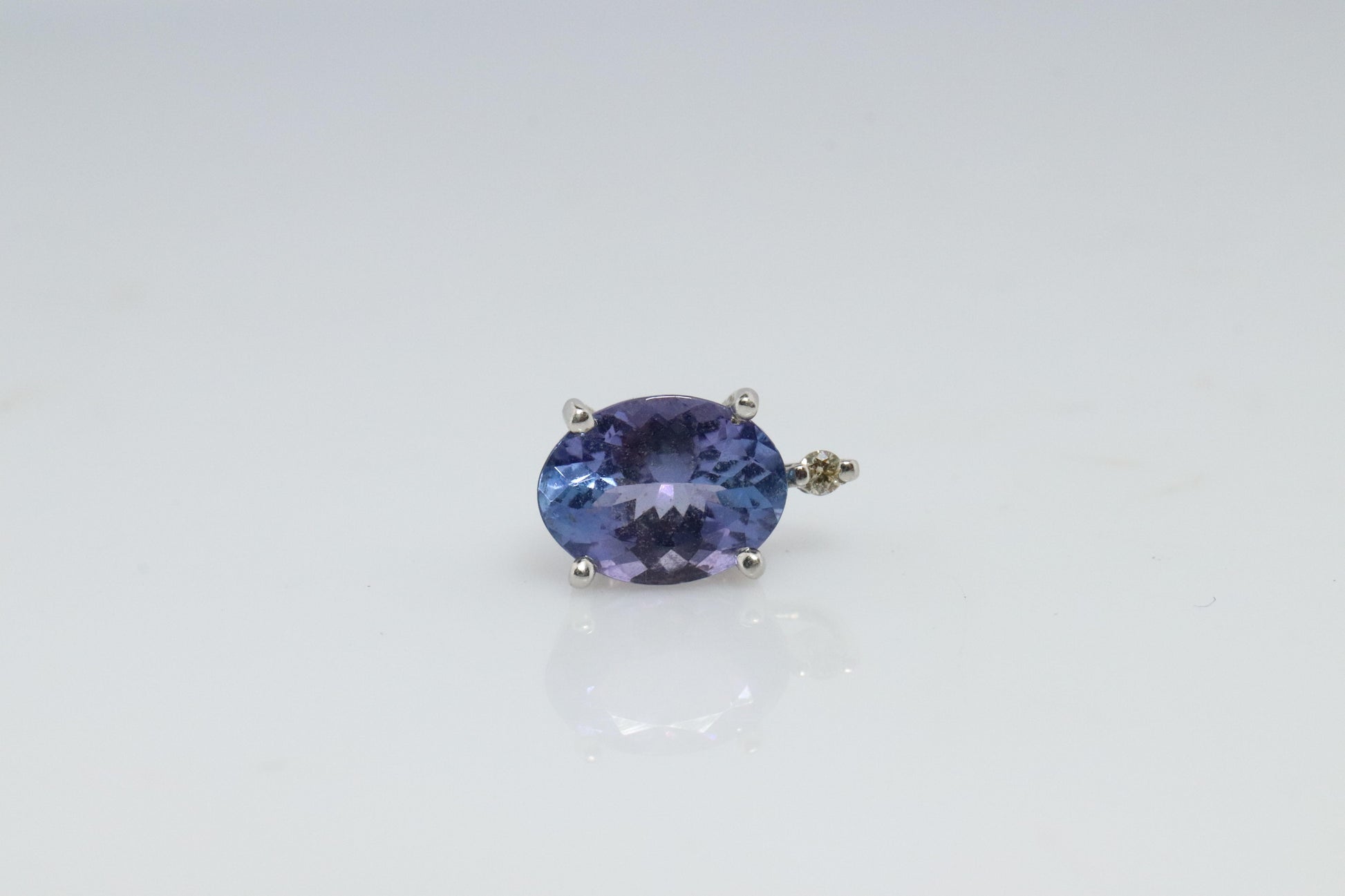 Tanzanite and diamond Pendant. PT850 Platinum Dainty Oval Tanzanite Solitaire