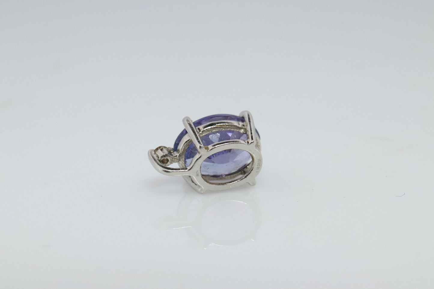 Tanzanite and diamond Pendant. PT850 Platinum Dainty Oval Tanzanite Solitaire