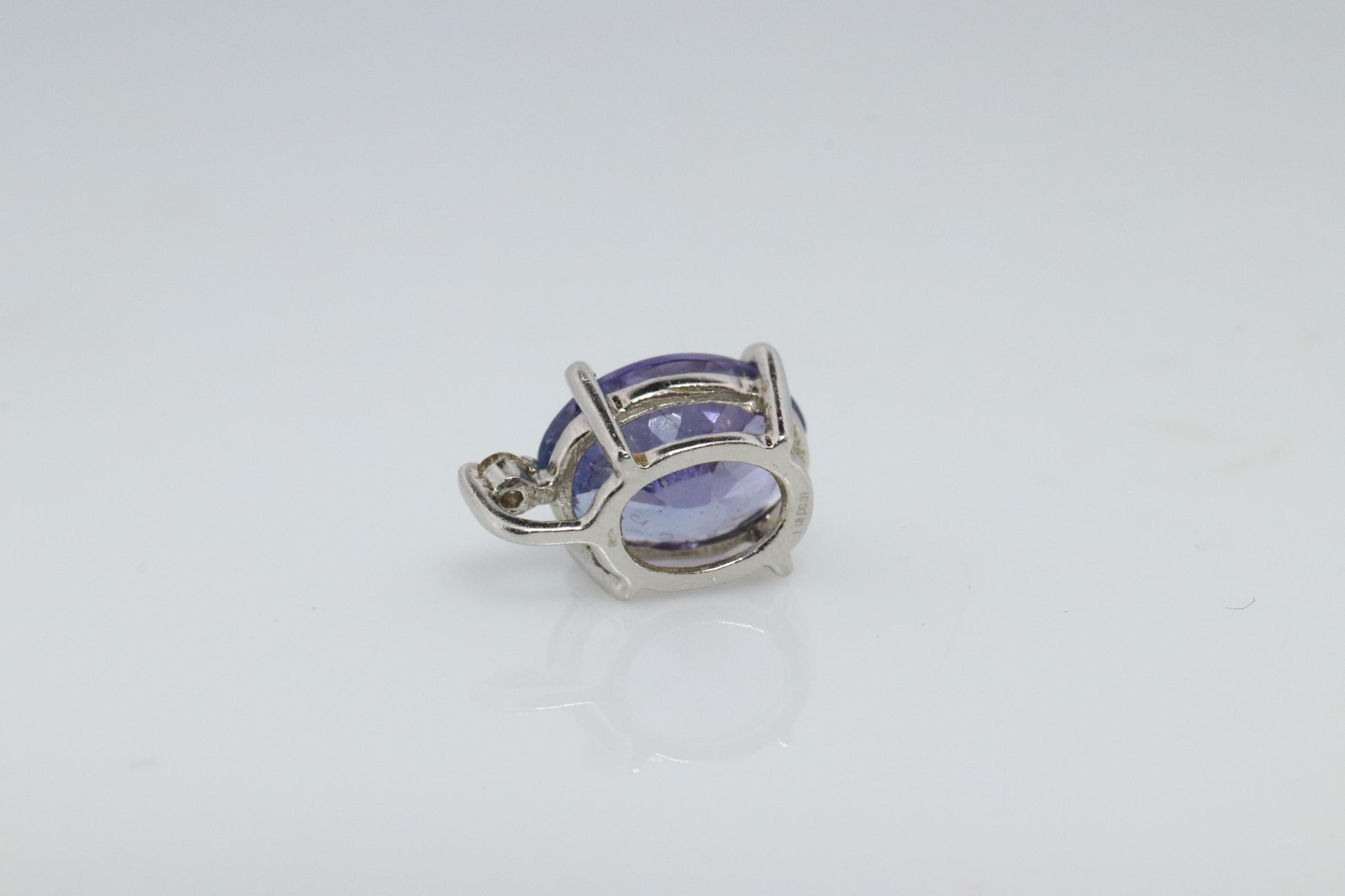 Tanzanite and diamond Pendant. PT850 Platinum Dainty Oval Tanzanite Solitaire