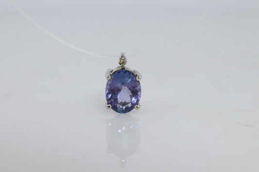 Tanzanite and diamond Pendant. PT850 Platinum Dainty Oval Tanzanite Solitaire