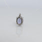 Tanzanite and diamond Pendant. PT850 Platinum Dainty Oval Tanzanite Solitaire
