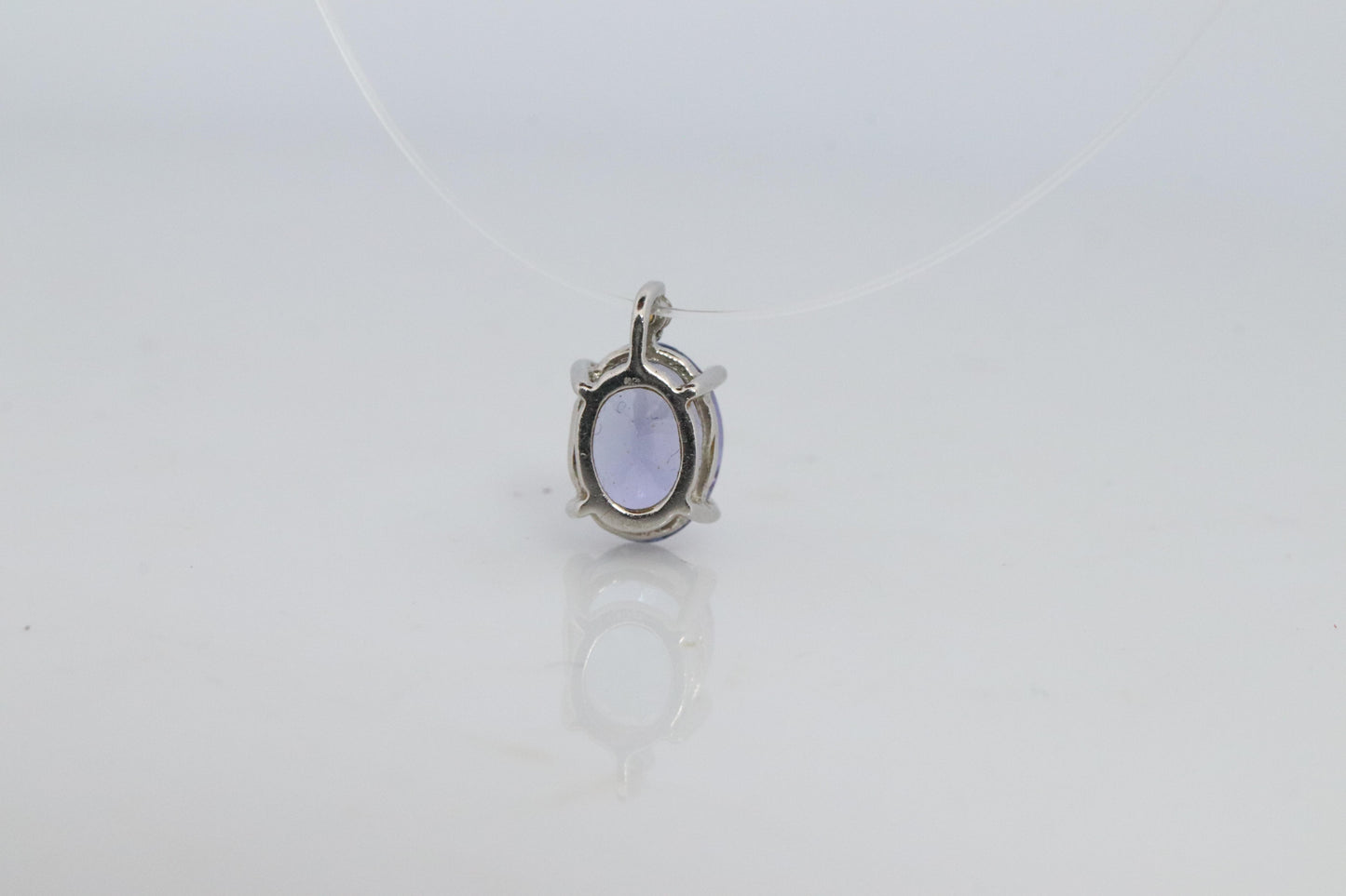 Tanzanite and diamond Pendant. PT850 Platinum Dainty Oval Tanzanite Solitaire