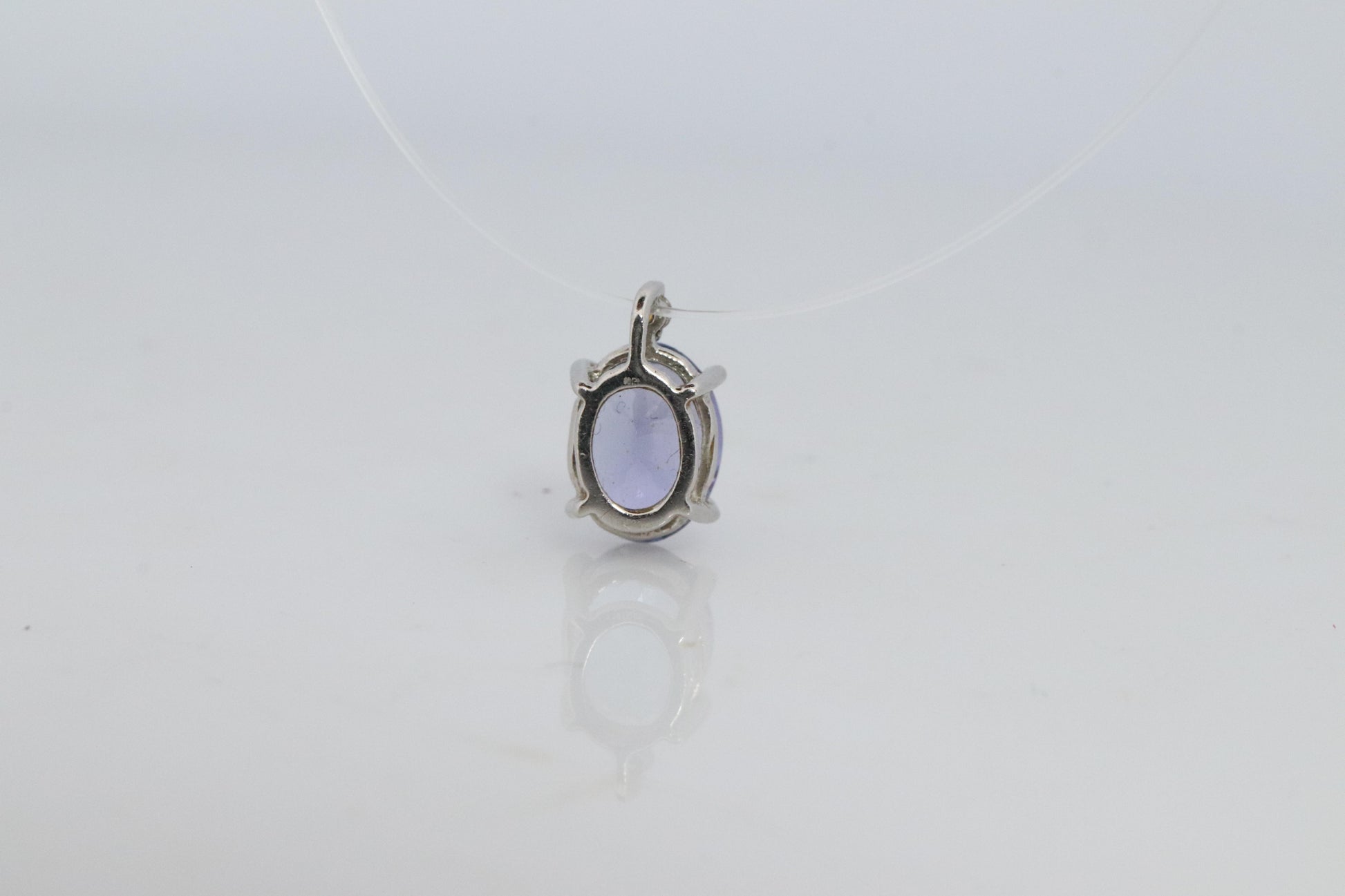 Tanzanite and diamond Pendant. PT850 Platinum Dainty Oval Tanzanite Solitaire