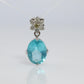 18k Blue TOPAZ Pendant. High quality solitaire oval pendant with Daisy Diamonds.