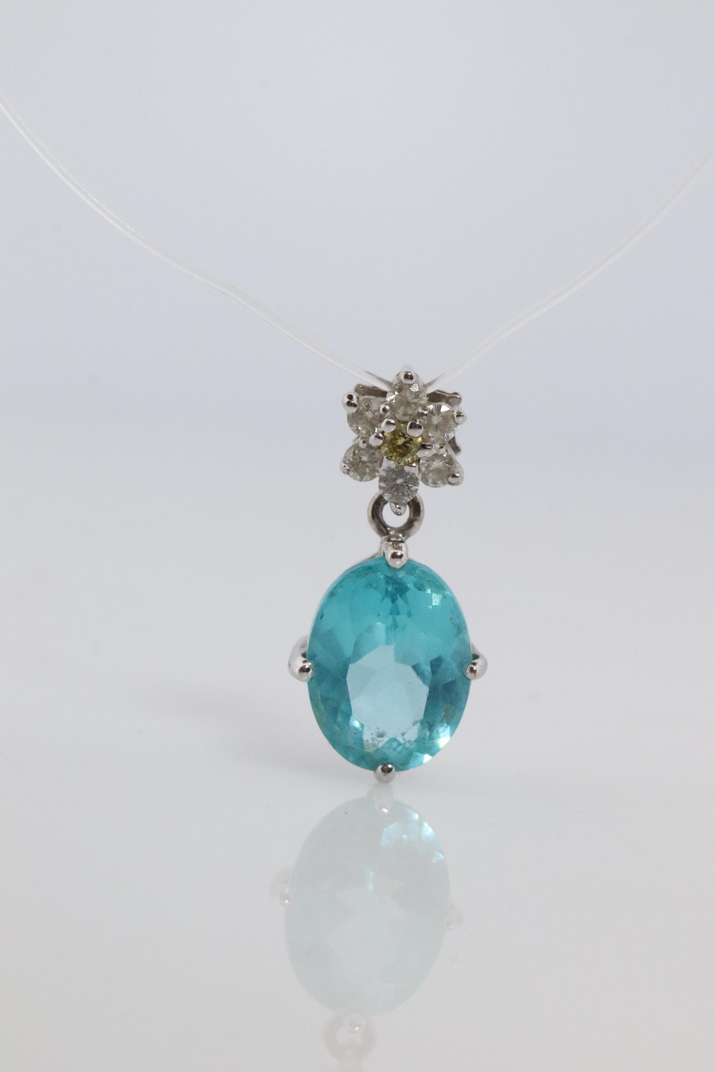 18k Blue TOPAZ Pendant. High quality solitaire oval pendant with Daisy Diamonds.