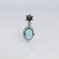 18k Blue TOPAZ Pendant. High quality solitaire oval pendant with Daisy Diamonds.