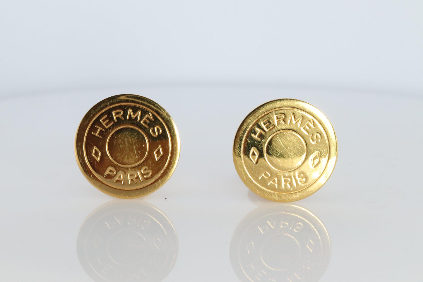 Hermes Clou de Selle Earrings. Genuine Vintage Hermes Round golden Clip on
