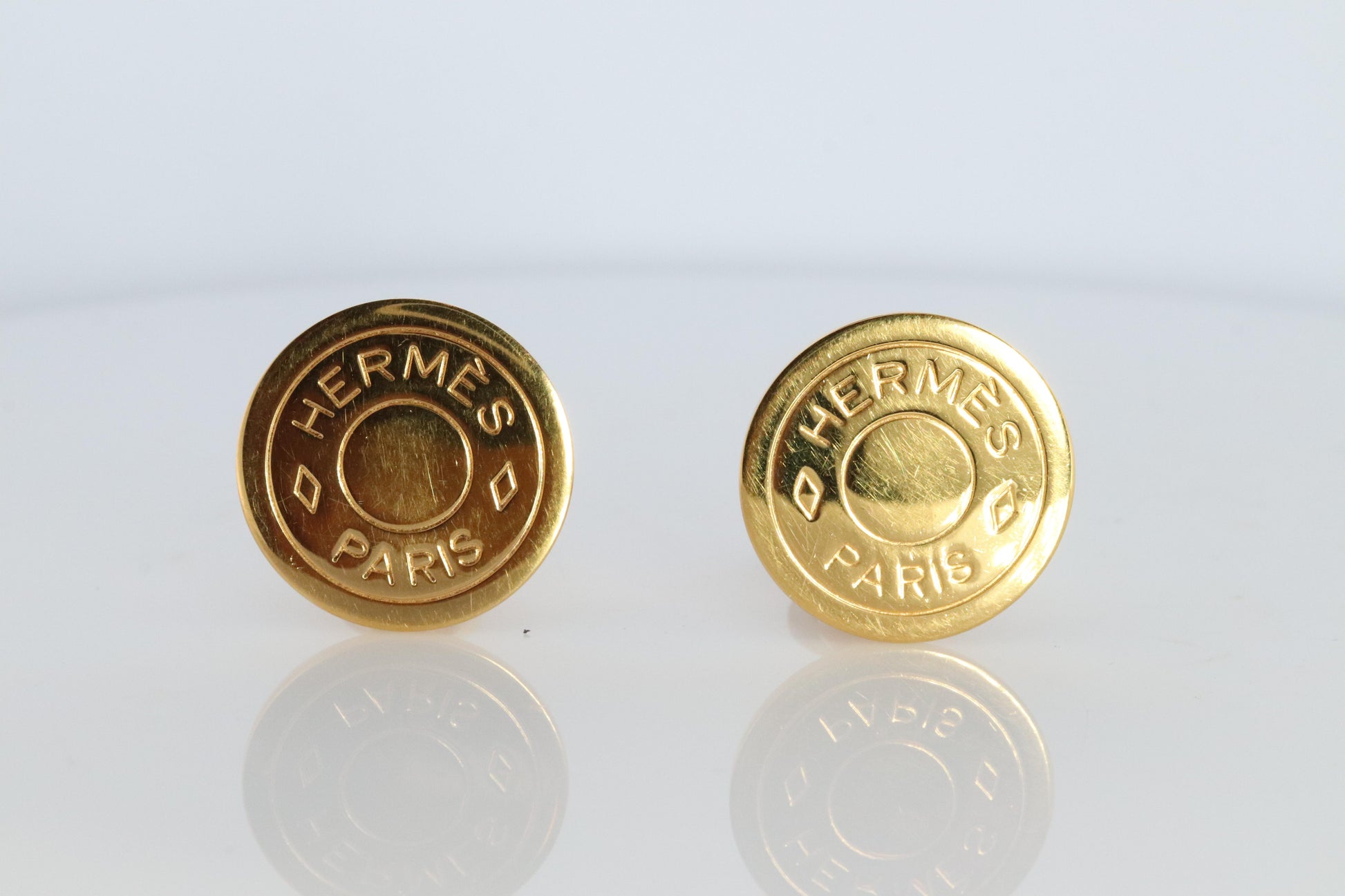 Hermes Clou de Selle Earrings. Genuine Vintage Hermes Round golden Clip on