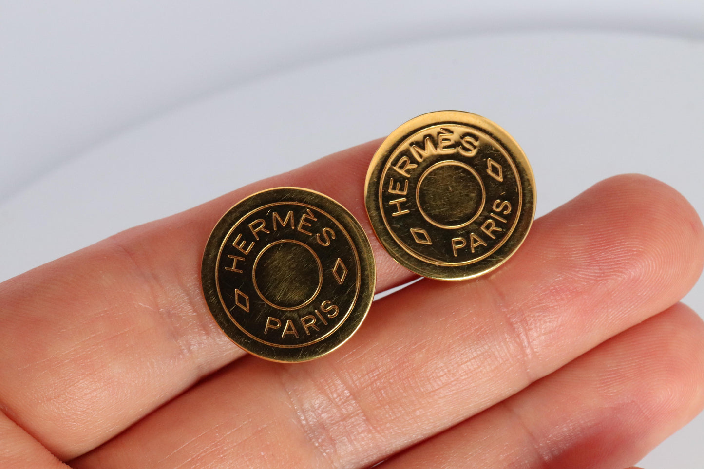 Hermes Clou de Selle Earrings. Genuine Vintage Hermes Round golden Clip on