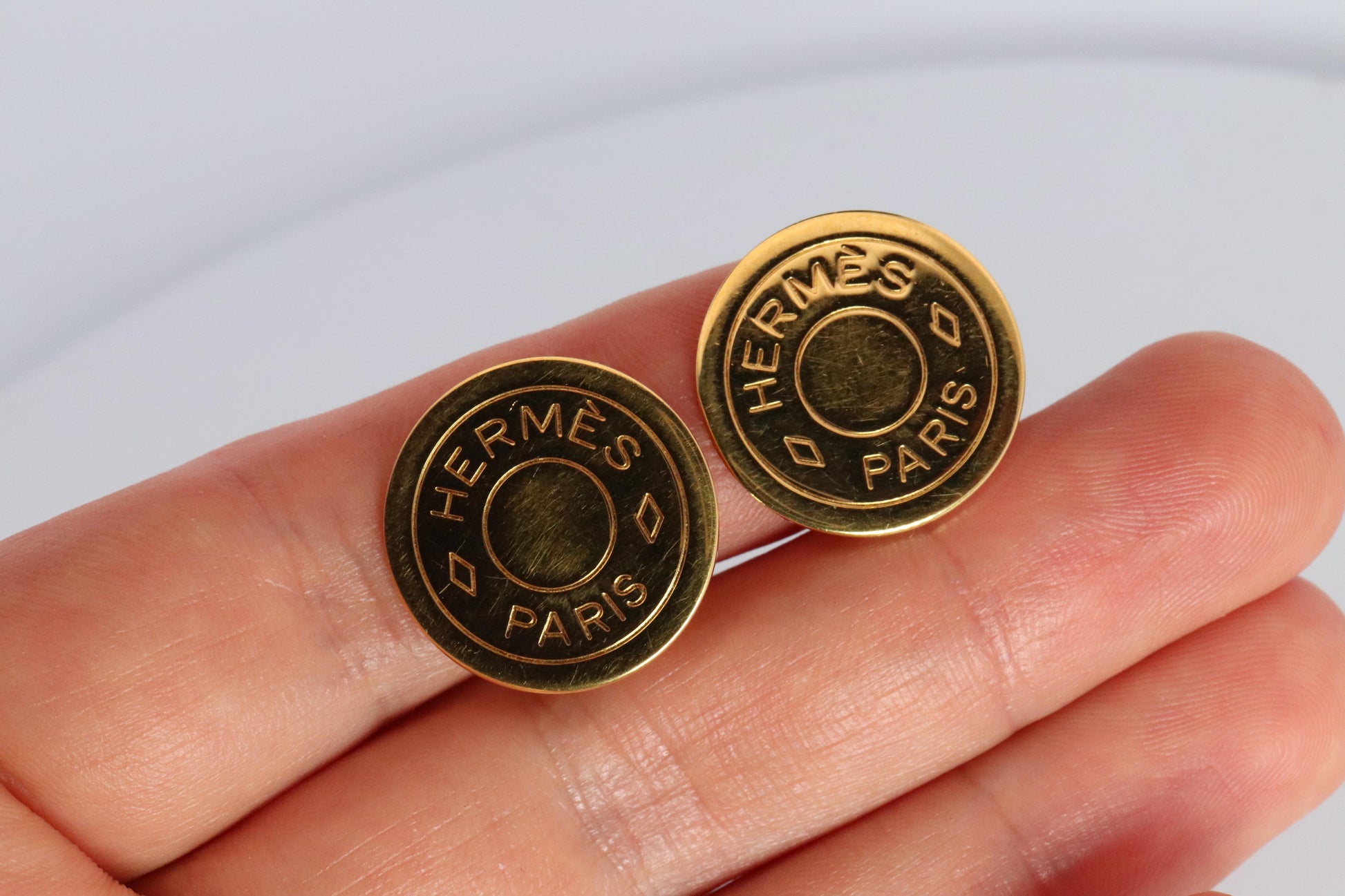 Hermes Clou de Selle Earrings. Genuine Vintage Hermes Round golden Clip on
