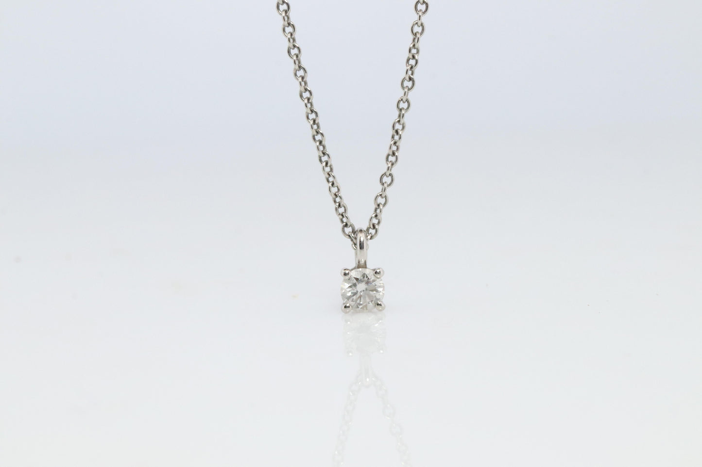 Tiffany Co Diamond Solitaire Necklace. Platinum 0.15ct Diamond Pendant.