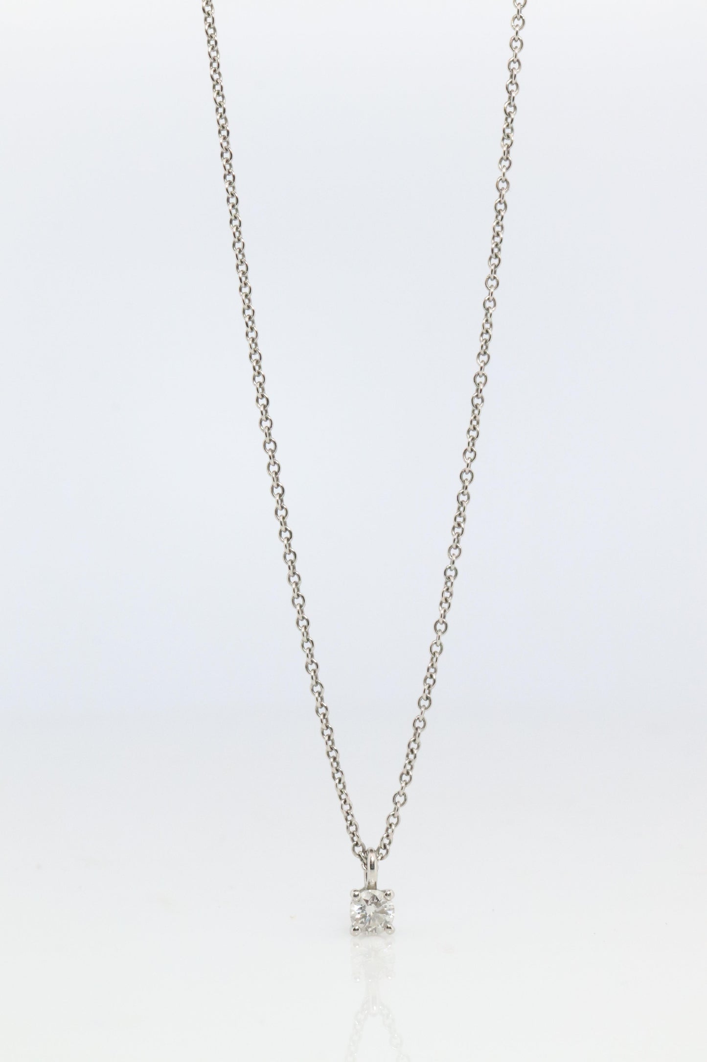 Tiffany Co Diamond Solitaire Necklace. Platinum 0.15ct Diamond Pendant.