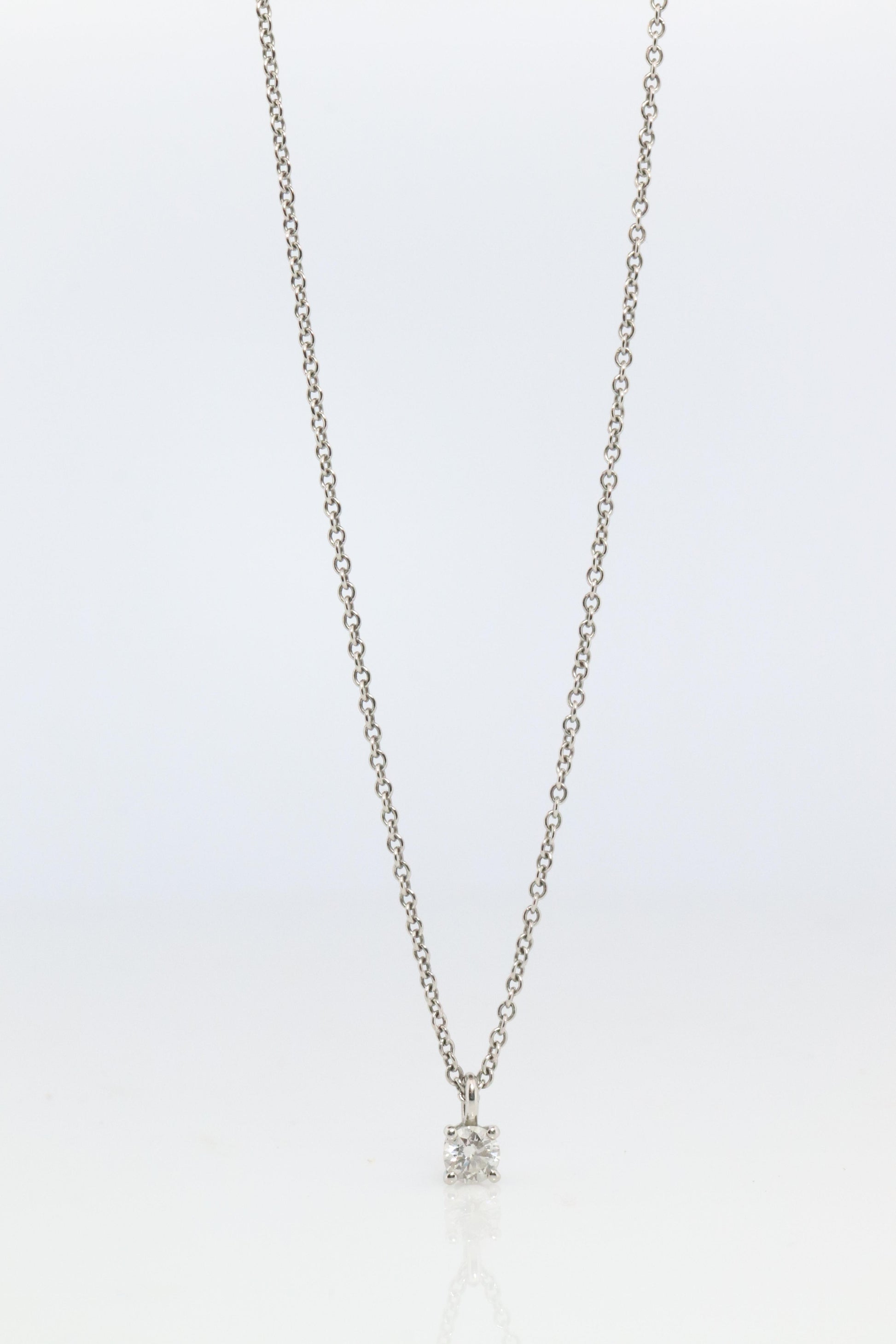 Tiffany Co Diamond Solitaire Necklace. Platinum 0.15ct Diamond Pendant.