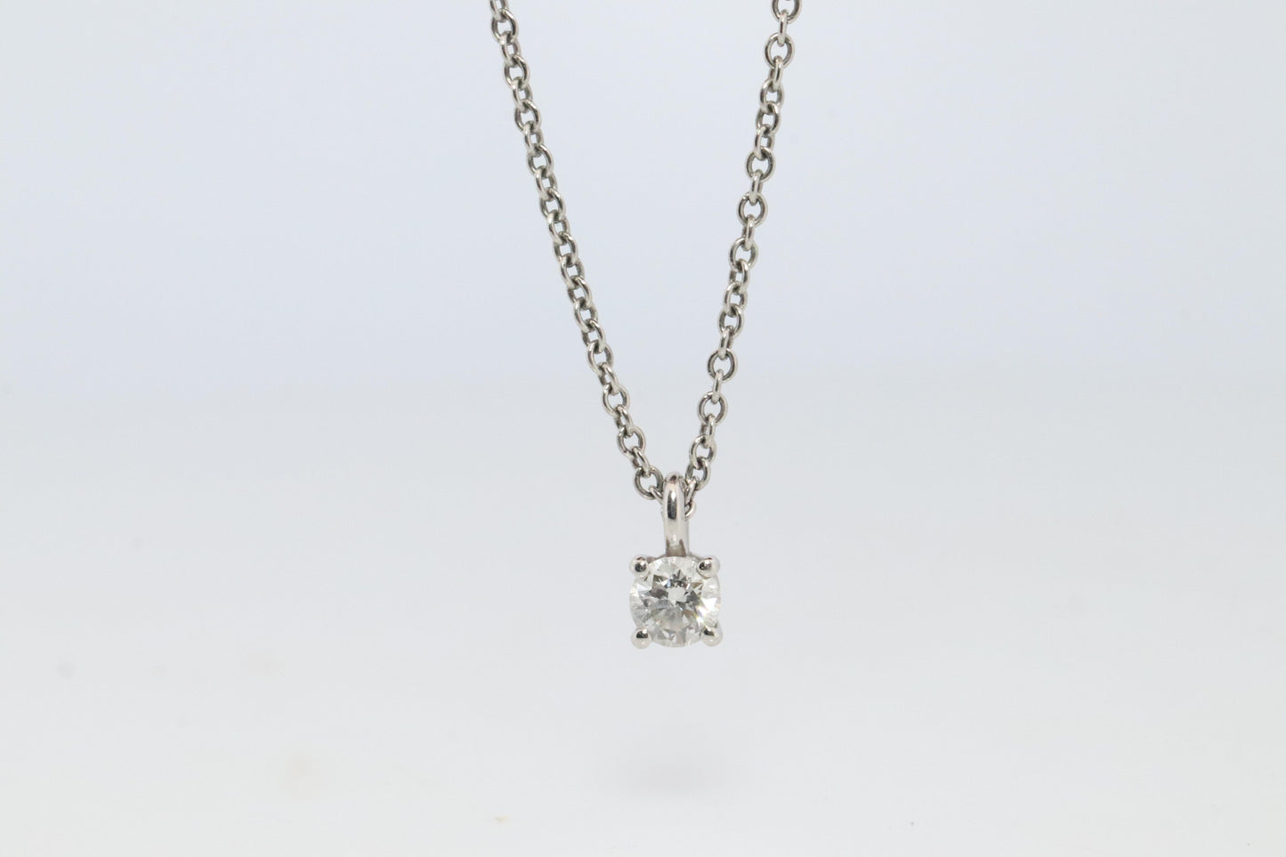Tiffany Co Diamond Solitaire Necklace. Platinum 0.15ct Diamond Pendant.