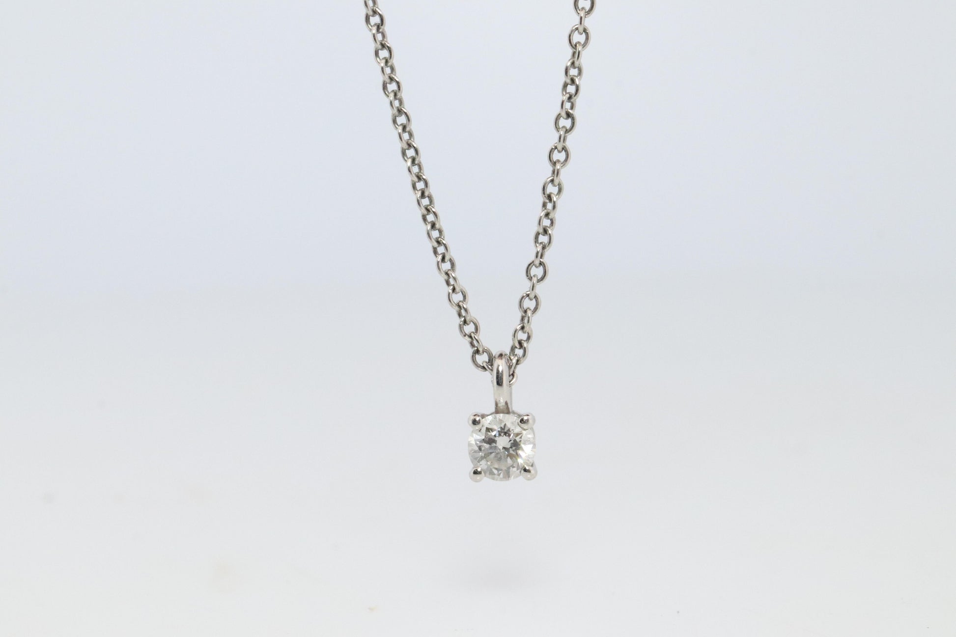Tiffany Co Diamond Solitaire Necklace. Platinum 0.15ct Diamond Pendant.