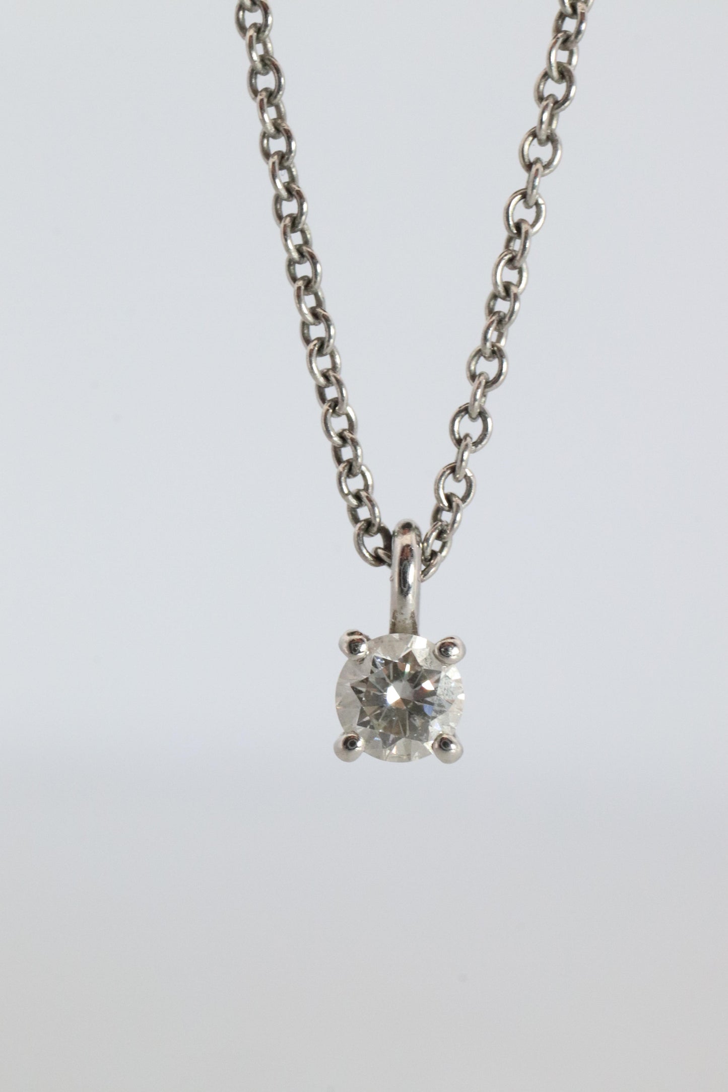 Tiffany Co Diamond Solitaire Necklace. Platinum 0.15ct Diamond Pendant.